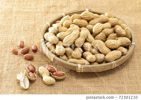 A peanut with a shell placed on a linen cloth A peanut with a shell placed on a linen cloth 72301210