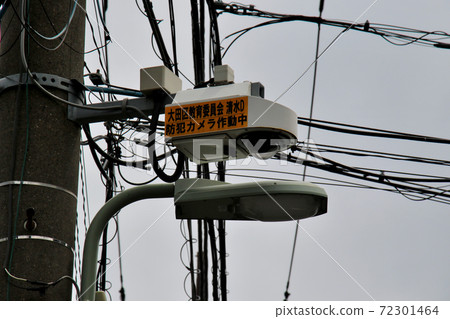 A security camera installed on a telephone pole on the way to Senzokuike Park in Minamisenzoku, Ota-ku, Tokyo 72301464