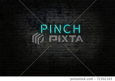 Night view of neon sign on brick wall Night view of neon sign on brick wall 72302183