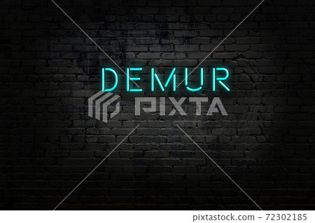 Night view of neon sign on brick wall Night view of neon sign on brick wall 72302185