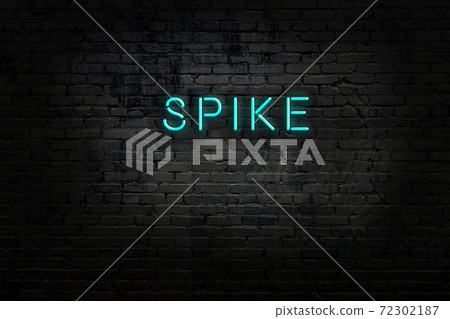 Night view of neon sign on brick wall Night view of neon sign on brick wall 72302187