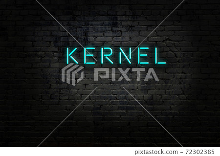 Night view of neon sign on brick wall 72302385