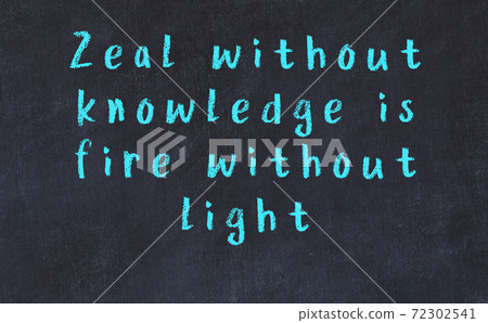 Chalk wise inscription on black chalkboard Chalk wise inscription on black chalkboard 72302541