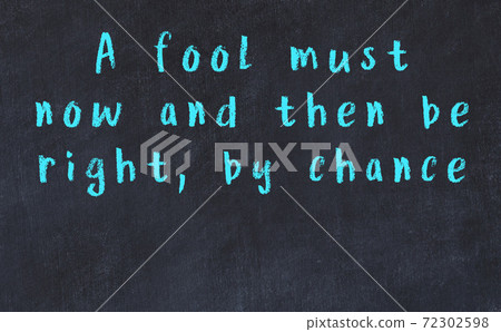 Black chalkboard with wise inscription on it 72302598