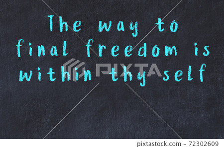 Chalk inscription of smart quote on black desk Chalk inscription of smart quote on black desk 72302609