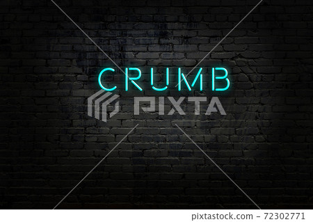 Night view of neon sign on brick wall Night view of neon sign on brick wall 72302771