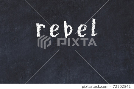 Black chalkboard with inscription rebel on in 72302841
