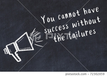 Chalk loudspeaker and wise quote on black desk Chalk loudspeaker and wise quote on black desk 72302859