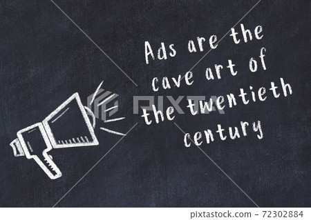 Chalk loudspeaker and wise quote on black desk Chalk loudspeaker and wise quote on black desk 72302884