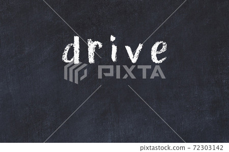 Black chalkboard with inscription drive on in 72303142