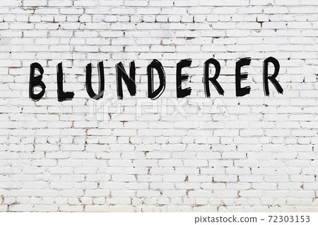 Word blunderer painted on white brick wall 72303153