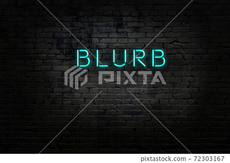 Night view of neon sign on brick wall 72303167