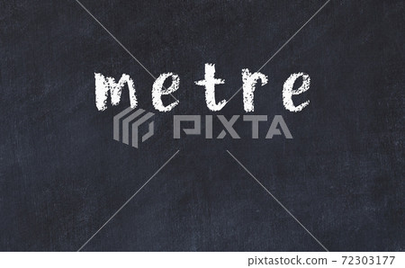 Black chalkboard with inscription metre on in Black chalkboard with inscription metre on in 72303177