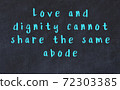 Chalk inscription of smart quote on black desk 72303385