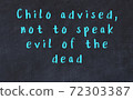 Chalk wise inscription on black chalkboard 72303387