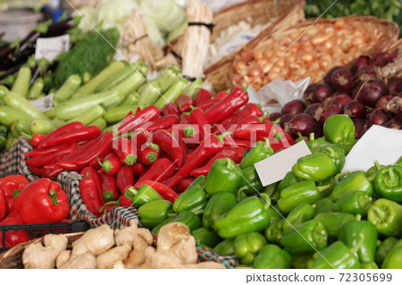 Fresh organic food at outdoors farmers market. Fresh organic food at outdoors farmers market. 72305699