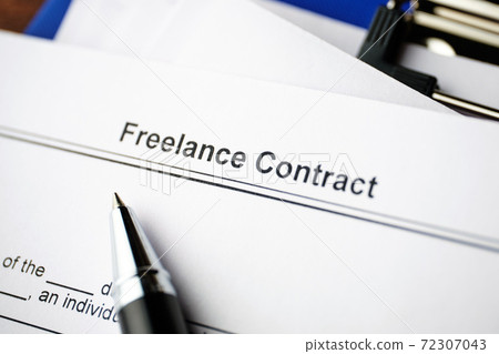 Legal document Freelance Contract on paper close up Legal document Freelance Contract on paper close up 72307043
