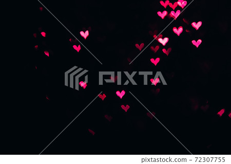 Defocused bokeh lights in shape of pink and red hearts. Defocused bokeh lights in shape of pink and red hearts. 72307755