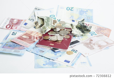 Cash on table isolated: dollars, euro, rubl broken money. All in mess, global crisis . passport travel concept Cash on table isolated: dollars, euro, rubl broken money. All in mess, global crisis . passport travel concept 72308812
