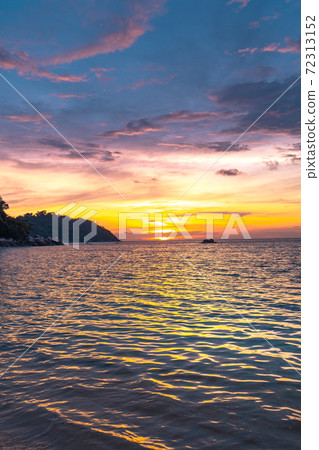 Evening sky and boat on the island 72313152