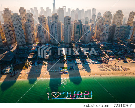JBR beach and Dubai Marina skyscrapers aerial view 72318767
