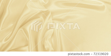 Smooth elegant golden silk or satin luxury cloth texture as wedding background. Luxurious background design. In Sepia toned. Retro style Smooth elegant golden silk or satin luxury cloth texture as wedding background. Luxurious background design. In Sepia toned. Retro style 72319020