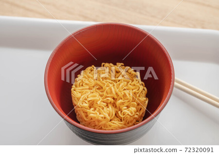 Instant noodles in a bowl Instant noodles in a bowl 72320091