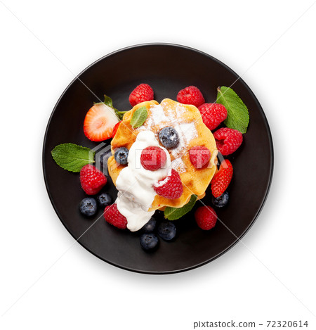 Delicious belgian waffles with summer berries 72320614