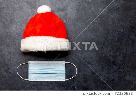 Christmas card with santa hat and face mask 72320688