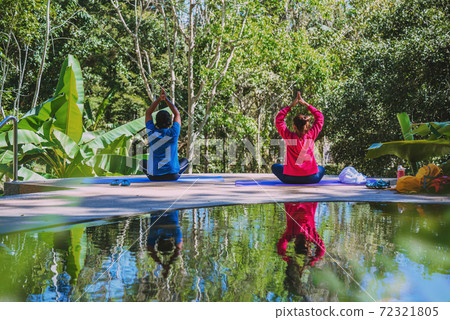 Yoga posture concept,Good health care with yoga postures. Outdoor exercise Relax yoga. Yoga posture concept,Good health care with yoga postures. Outdoor exercise Relax yoga. 72321805