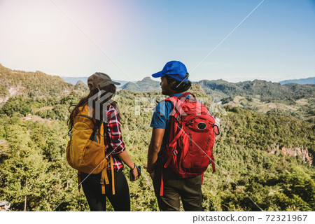Travel, nature travel of Asian couples while is relaxing outdoors during his trip in Thailand. 72321967