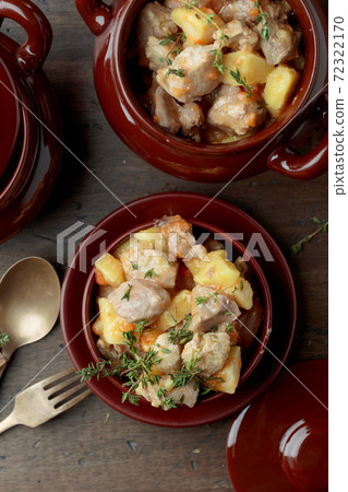 Irish stew sprinkled with green thyme. 72322170