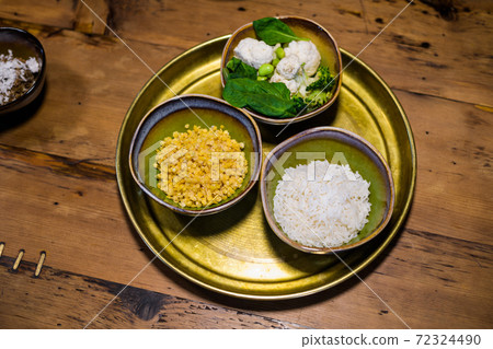 Asian style food, close up picture of ceramic bowls with jasmine Asian style food, close up picture of ceramic bowls with jasmine 72324490