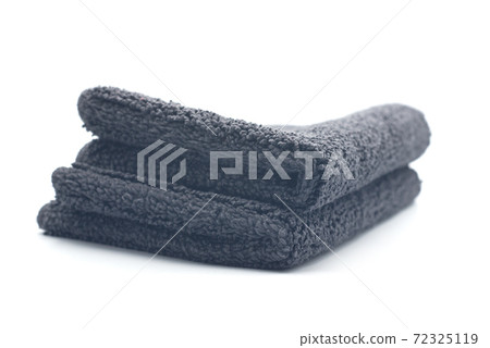 Closeup of black bathroom carpet pile on white background 72325119