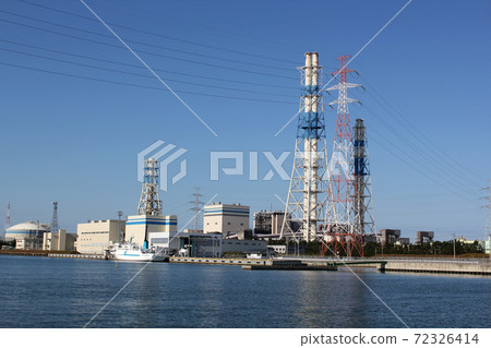Buildings and transmission towers near the cove Buildings and transmission towers near the cove 72326414