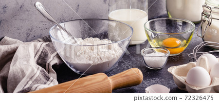 Cooking ingredients for dough, eggs, flour, sugar, milk. Cooking ingredients for dough, eggs, flour, sugar, milk. 72326475