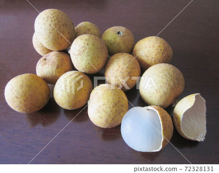 Tropical fruit longan on the table 72328131