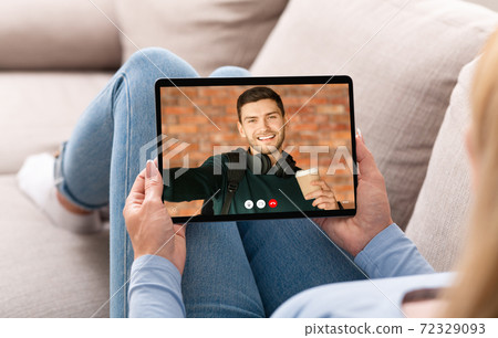 Girlfriend Making Video Call Talking With Boyfriend At Home, Cropped Girlfriend Making Video Call Talking With Boyfriend At Home, Cropped 72329093