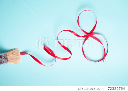 Red gift celebration ribbon in 8 digit shape. Happy woman's day 72329764