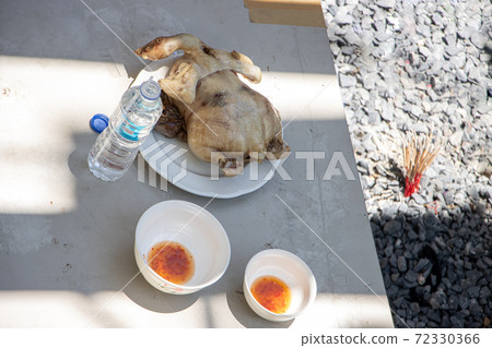 Dead poultry on the table, ritual ceremony for elimination a supernatural forces,  72330366