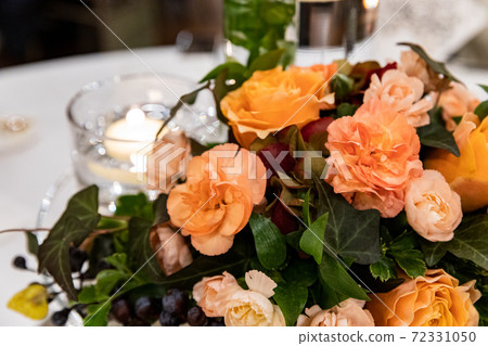 Flower arrangement on the table of the reception Flower arrangement on the table of the reception 72331050