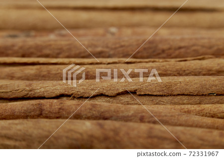 Cinnamon close up on a white background 72331967