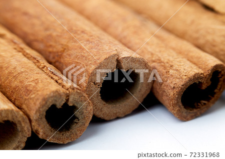 Cinnamon close up on a white background 72331968