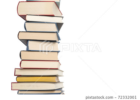 Pile of books stacked on a white background with space for copy 72332001