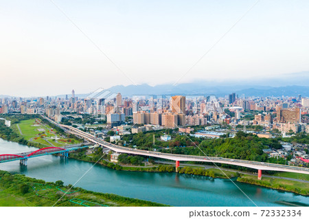 Asia business concept image, panoramic modern cityscape building birds eye view under sunrise and morning blue bright sky, shot in Taipei, Taiwan 72332334