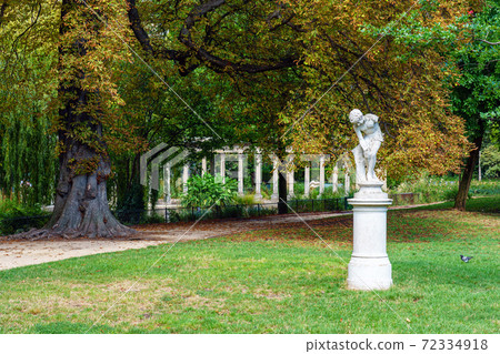 Statue Le joueur de bille in the Parc Monceau - Paris, France Statue Le joueur de bille in the Parc Monceau - Paris, France 72334918