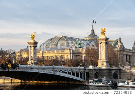 Alexandre III bridge and Grand Palais at golden hour in Paris - France Alexandre III bridge and Grand Palais at golden hour in Paris - France 72334938