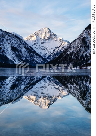Landscape in Austria. Mountains and reflections in the lake. Landscape in Austria. Mountains and reflections in the lake. 72335319