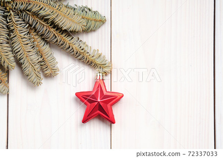 Christmas white wooden pattern with Christmas tree branches and toys Christmas white wooden pattern with Christmas tree branches and toys 72337033