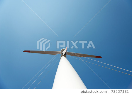 repair work on the blades of a windmill for electric power production - copy space 72337381